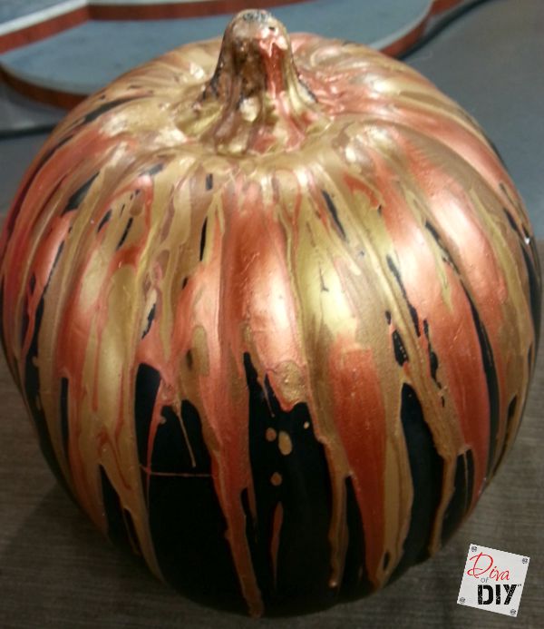 How to turn you Black Foam Pumpkin into an exploding metallic lava pumpkin! It is a great kids Halloween craft for Halloween party decorations.