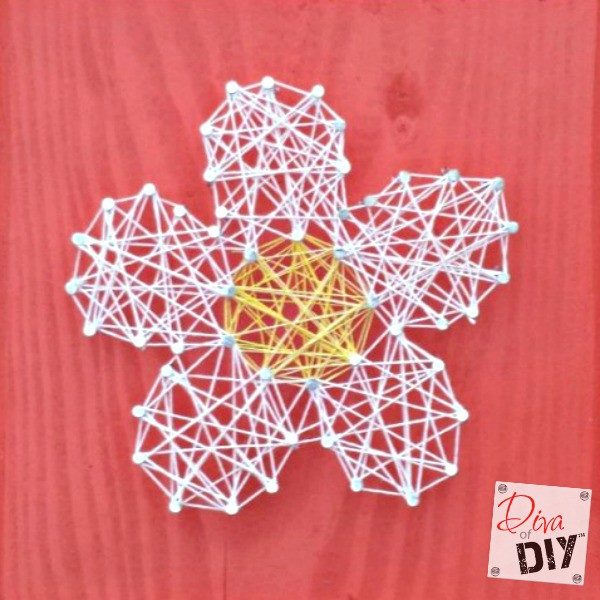 This Easy Valentine's Day Craft DIY string art tutorial is fun for adults and children alike! Create a Valentine's Day Craft or everyday craft for kids!
