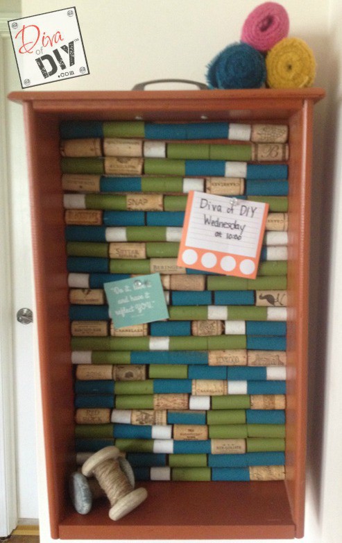Looking for a unique corkboard idea? Make this DIY cork board with a repurposed drawer and wine corks! The perfect repurposed items project! Cork Crafts!