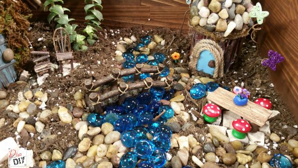 How to make a Fairy Garden DIY House complete with simple accessories you can make to create your own miniature diy village. Cheap ideas for Kids craft! 