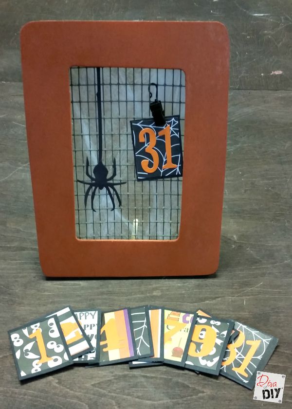 This cheap Halloween October calendar is the perfect Halloween decoration for kids to make! This Halloween dollar store frame = the perfect amount of scary!