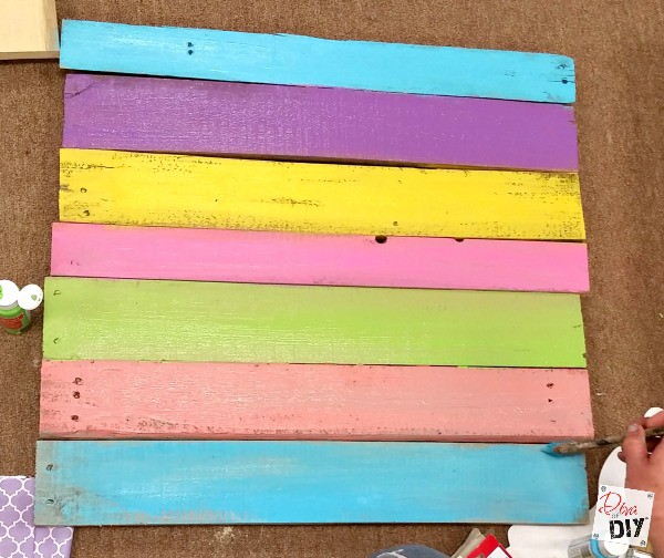 Rustic reclaimed wood signs are all the rage! Using pallet wood makes these signs a cheap and easy DIY to add to your Easter Decorations. Easter Bunny Sign!