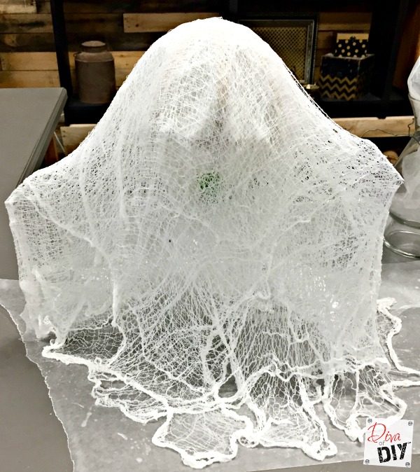 Make your own diy Cheesecloth Ghosts for your Halloween decorations. This is an easy Halloween kids craft and what kid doesn't like a DIY Halloween ghost!