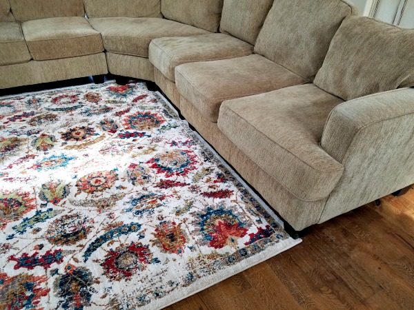 Need to add a punch of color to your decor? See how I transformed my family room with an amazing area rug for inspiration to update my modern rustic decor! 
