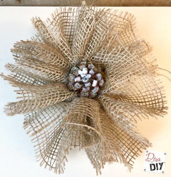 Rustic handmade ornaments are the perfect DIY Christmas craft ornament for your tree! Easy and affordable handmade burlap flowers for rustic decorations!