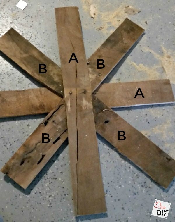 These DIY Pallet Snowflake are the perfect addition to your rustic Christmas and decorating! The are amazing Rustic fireplace mantle decorations all winter