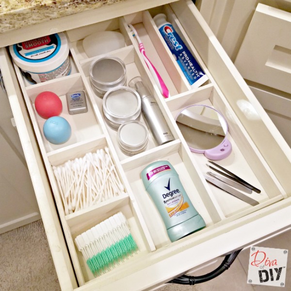 Get organized with this DIY custom wood drawer organizer! You can organize your bathroom or kitchen drawers with this easy DIY organization for the home!