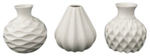These 3 white porcelain vases would look great grouped on your farmhouse table