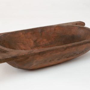 This wooden dough bowl will look great accessorized on your farmhouse table